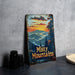 a metal sign that says misty mountains on it