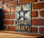 a lone star sign on a brick wall