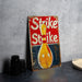 a picture of a strike strike sign on a table