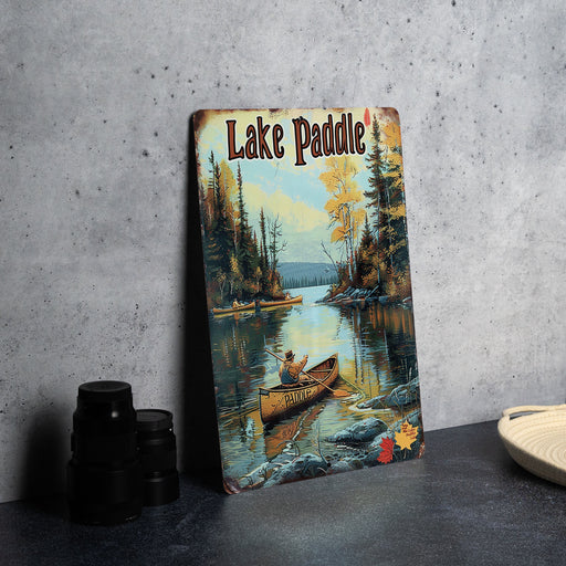 a picture of a lake paddle sign next to a pair of binoculars