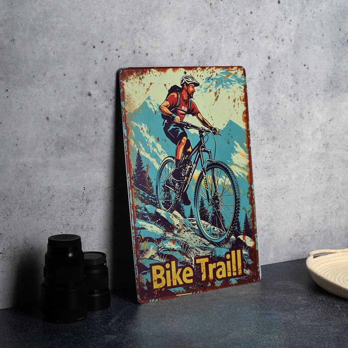 a bicycle trail sign sitting on top of a table
