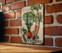 a sign on a brick wall that says grow veggies