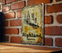 a sign on a brick wall that says highland spirits