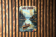 a painting of a man in a canoe on a lake