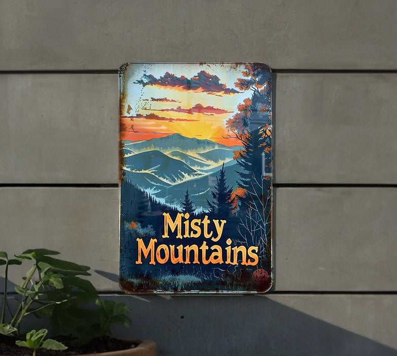 a rusty mountain sign hanging from the side of a building