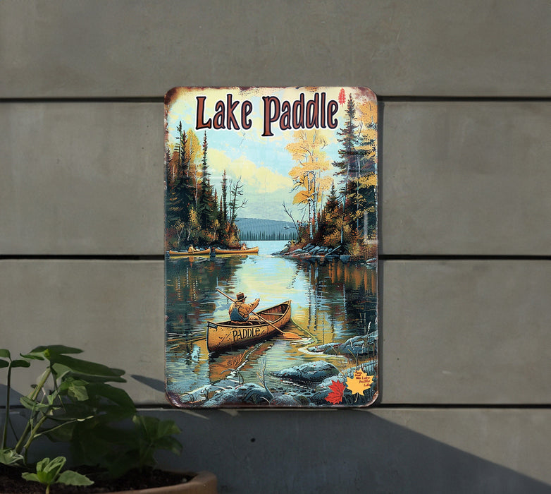 a lake paddle sign hanging on the side of a building