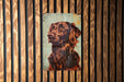 a painting of a dog on a wooden wall
