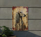 a painting of a long haired dog on a wall