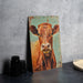 a painting of a brown cow on a wall
