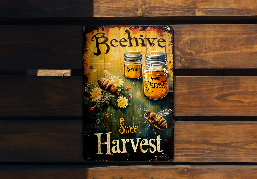 a beehive sign is hanging on a wooden wall
