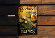 a beehive sign is hanging on a wooden wall