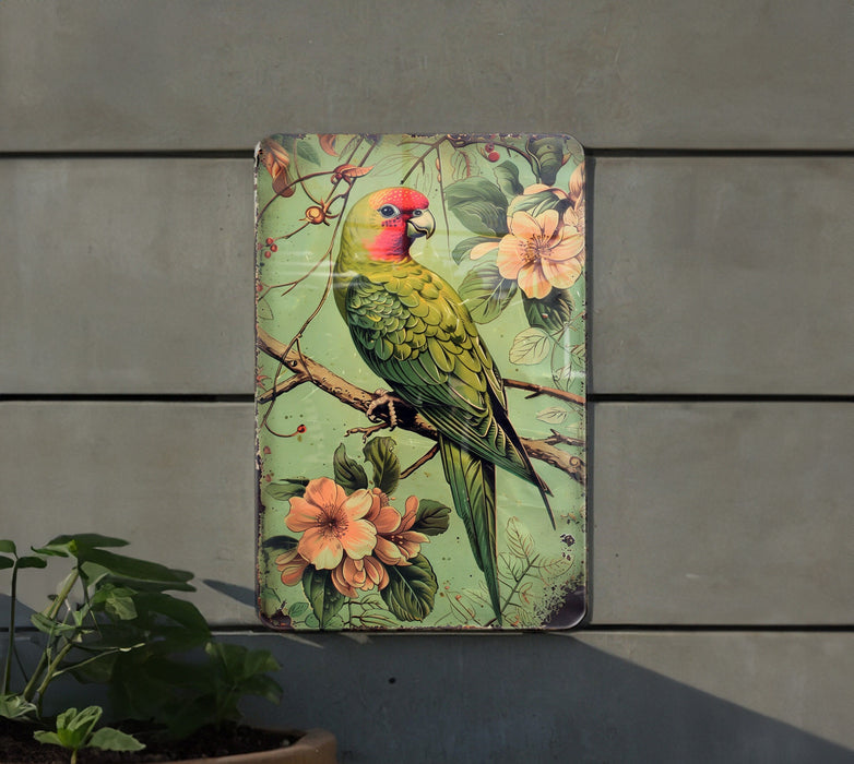 a green bird sitting on top of a tree branch