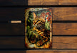 a picture of a cat sitting on a wooden bench