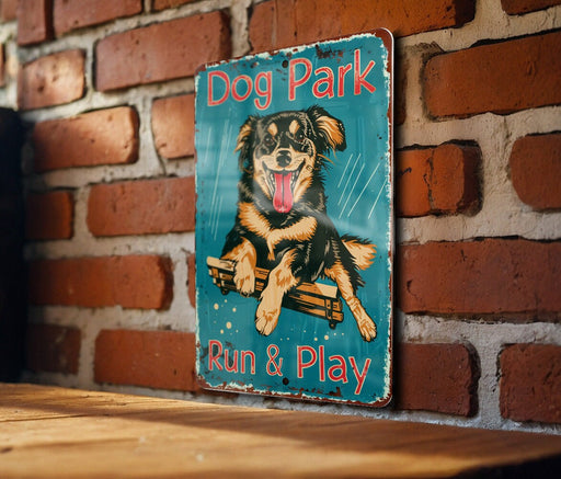 a dog park sign on a brick wall