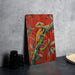 a painting of a lizard on a tree branch