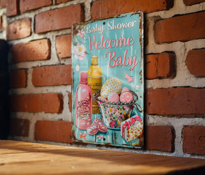 a welcome baby sign on a brick wall