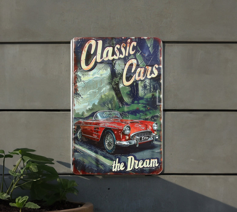 a sign on a wall that says classic cars the dream