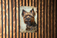 a painting of a dog on a wooden wall
