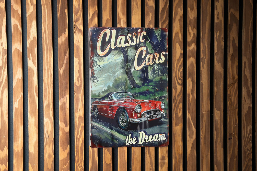 a poster of a classic car on a wooden wall