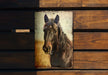 a picture of a horse on a wooden wall