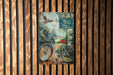 a painting of a bicycle on a wooden wall
