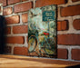 a painting of a bicycle on a brick wall