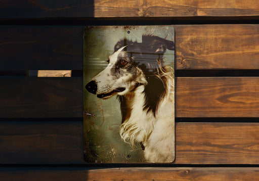 a picture of a dog hanging on a wooden wall