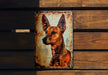 a rusted metal sign with a picture of a dog on it