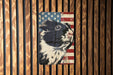 a picture of a guinea pig on a wooden wall