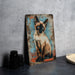a picture of a siamese cat on a wall