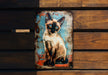 a picture of a siamese cat on a wooden wall