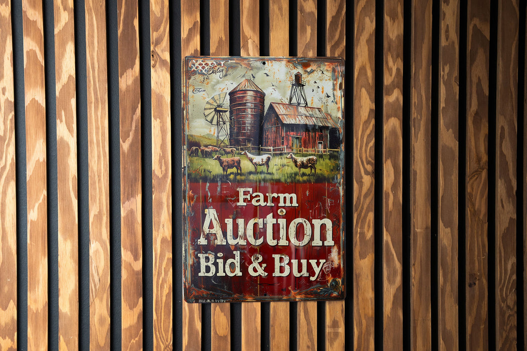 a farm auction sign on a wooden wall