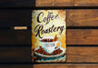 a sign that reads coffee roastery on it