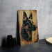 a painting of a german shepherd on a wooden plaque