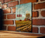 a brick wall with a painting on it