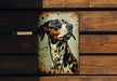 a metal sign with a dog painted on it