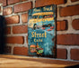 a picture of a food truck sign on a brick wall