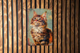 a painting of a cat on a wooden wall