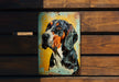 a painting of a dog on a wooden bench