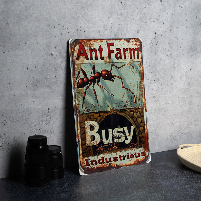 an ant farm sign sitting on top of a table