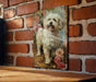 a picture of a dog on a brick wall