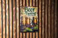 a beer sign hanging on the side of a wooden wall