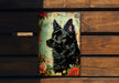 a picture of a black dog on a green background