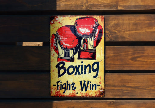 a sign on a wooden wall that says boxing fight win