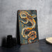 a painting of a snake on a wall