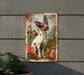 a painting of a dog is hanging on a wall