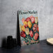 a book sitting on top of a table next to a plate
