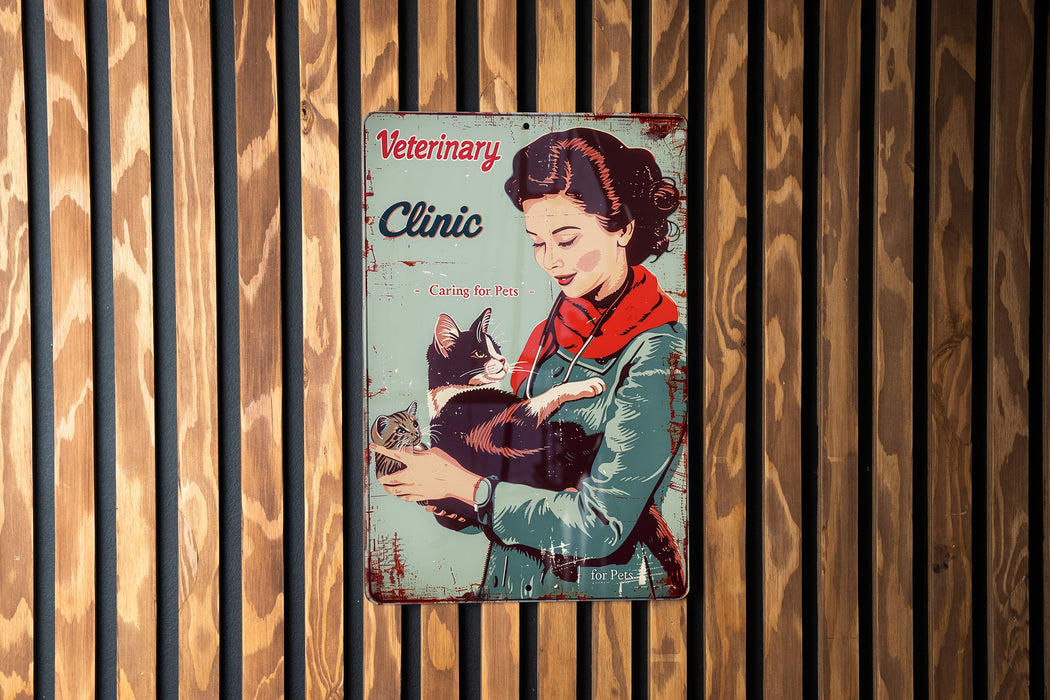 a vintage poster of a woman holding a cat