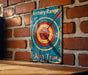 a sign on a brick wall that says archery range aim true