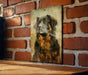 a picture of a dog on a brick wall
